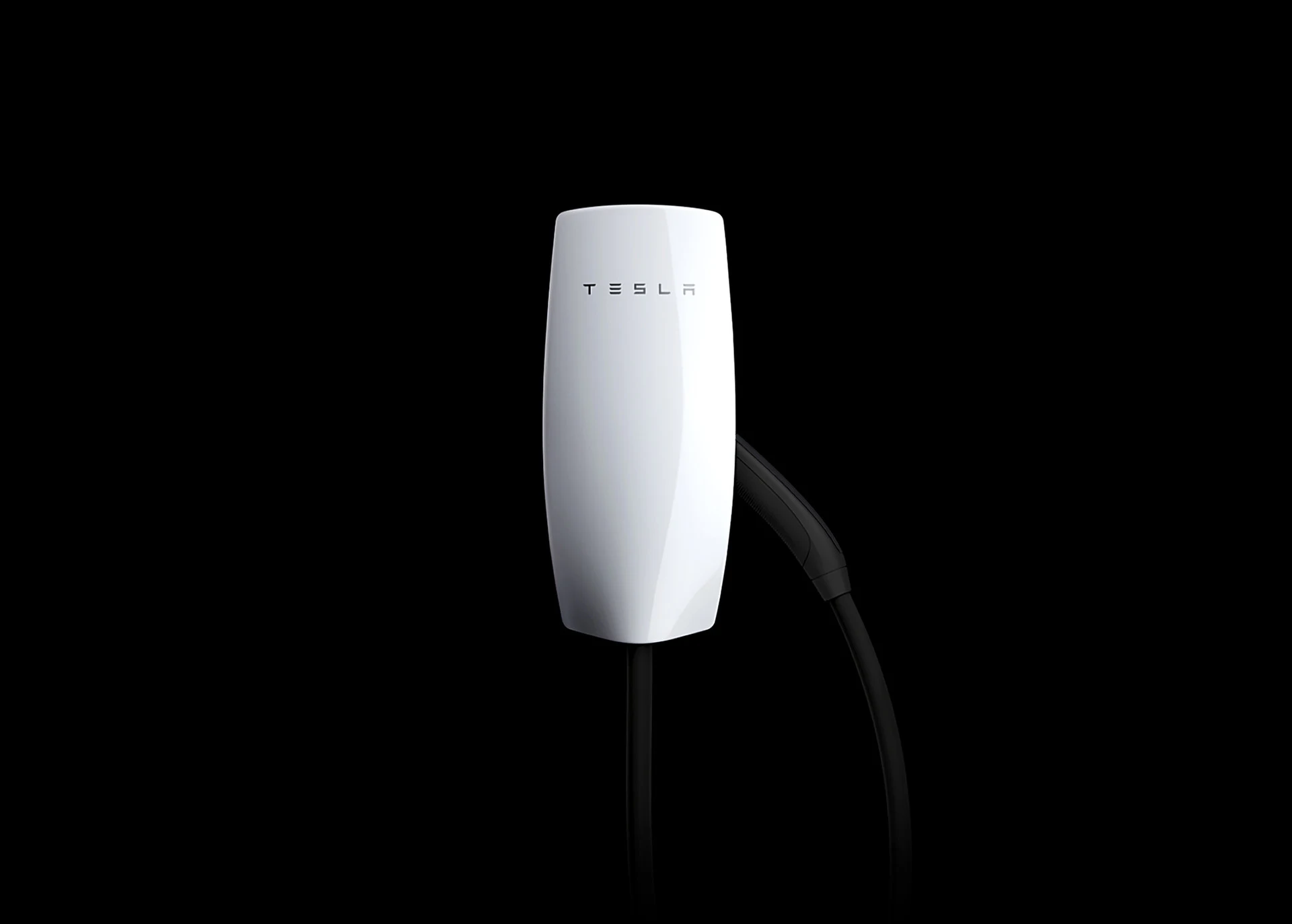 Borne Tesla Wall Connector blanche et son câble, présentés sur fond noir — visuel officiel Tesla